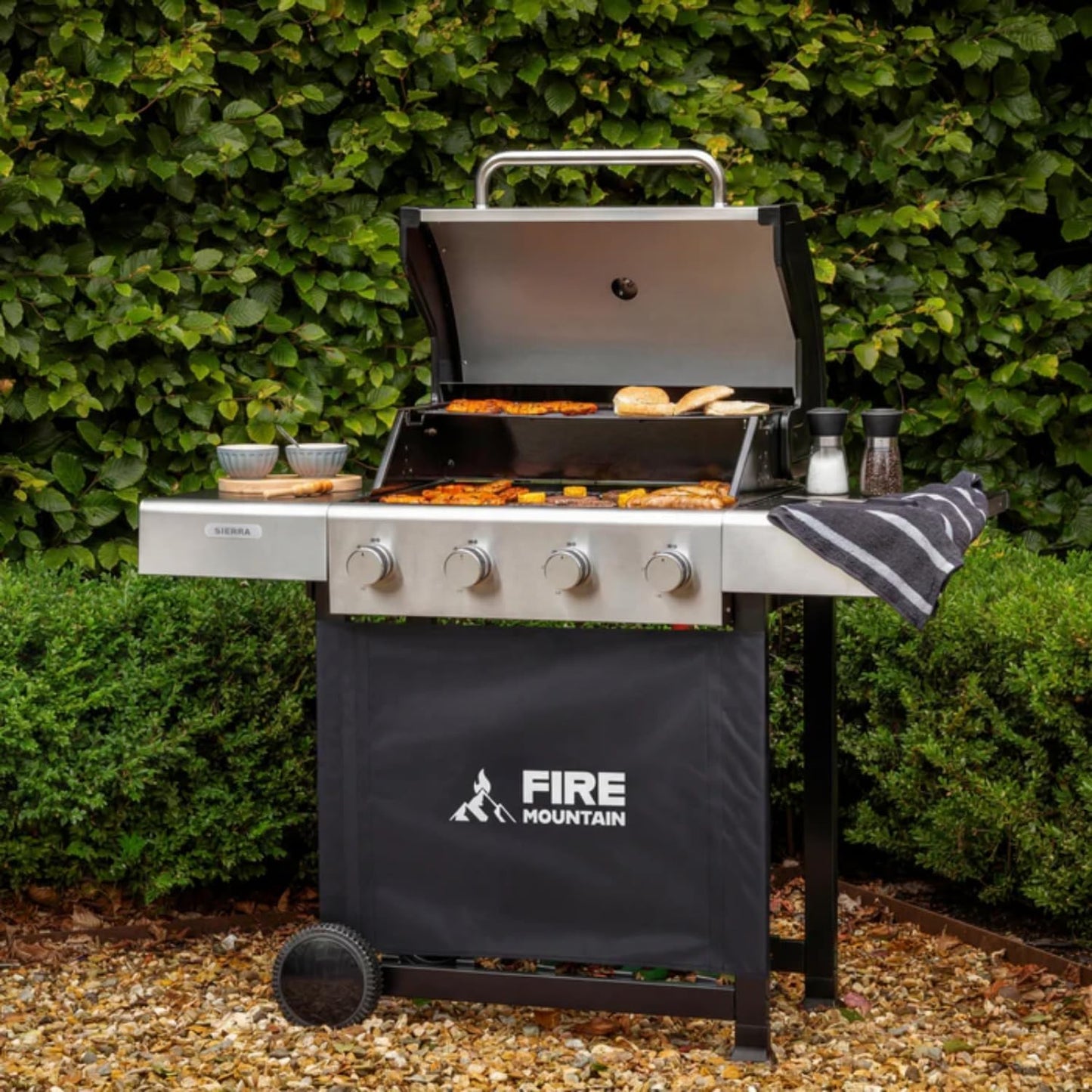 Sierra 4 Burner Gas BBQ Stainless Steel with Cast Iron Grill and Side Shelves Large Outdoor Barbecue for Garden Family Sized 60 X 42Cm Cooking Area